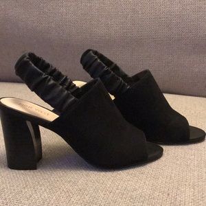 New.  Black peek-a-boo sandal with block heel